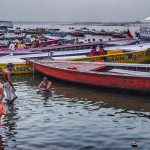 Bathing and praying in the sacred waters of the Ganges Varanasi