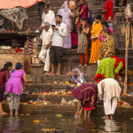 Morning rituals and prayers with discarded ceremonial flowers