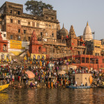 Early morning Hindu prayers and rituals with numerous palaces and temples in the background