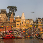 A panorama  showing some of the numerous Palaces, Temples, Ghats, and many Worshipers