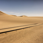 Sandstorms frequently cover the railroad tracks to Luderitz