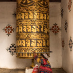 Buddist lady,prayer wheel, bhutan